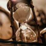 shallow focus photography of hourglass